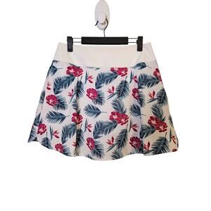 Puma white skort with leaf and flower print. Size M.